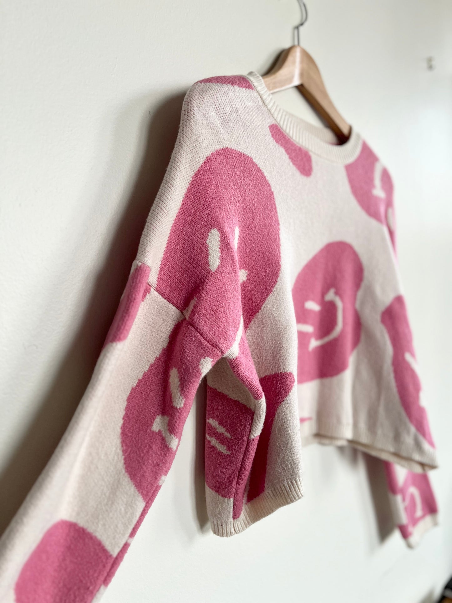 "Moon & Madison" pink and cream smiley faces sweater / Size XS