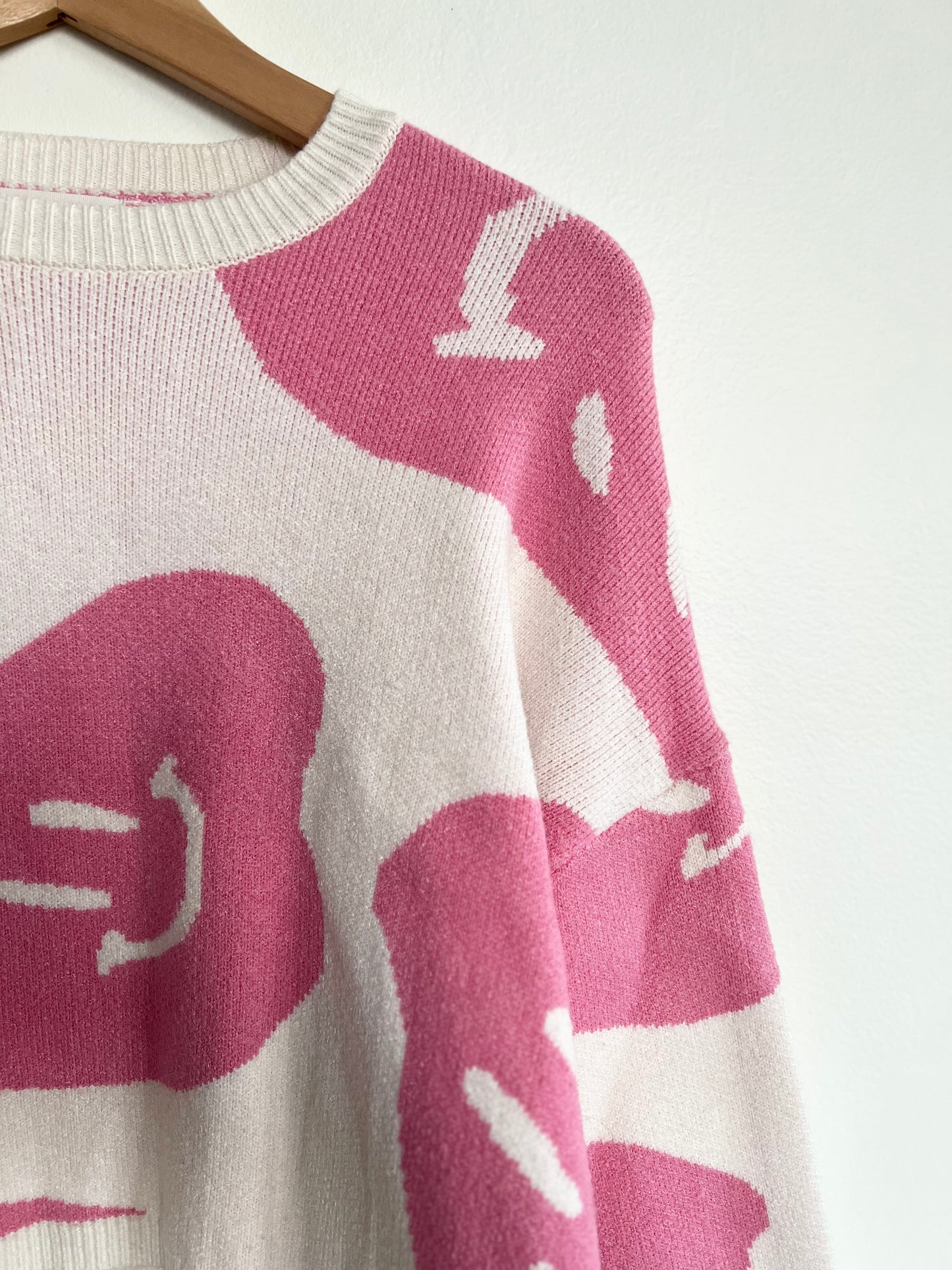"Moon & Madison" pink and cream smiley faces sweater / Size XS