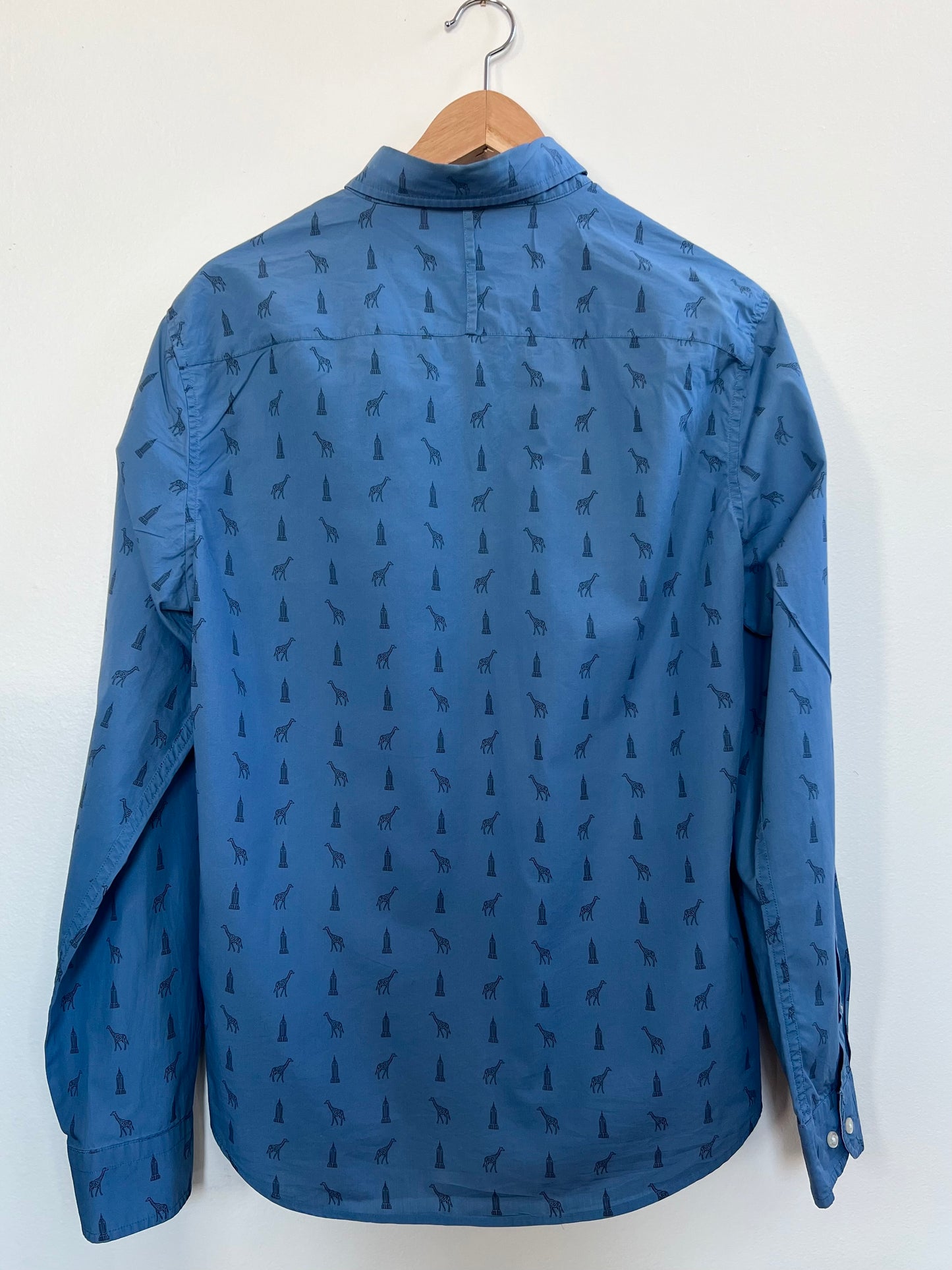 "Banana Republic" blue shirt with giraffe and building - Size M