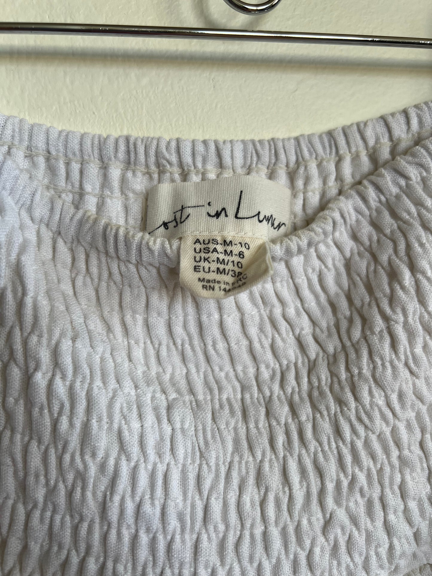 "Lost in lunar" ruffle mini skirt / Size M (runs small)